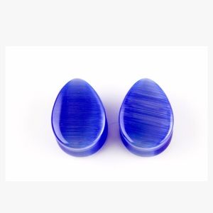 Blue cat eye glass plugs
